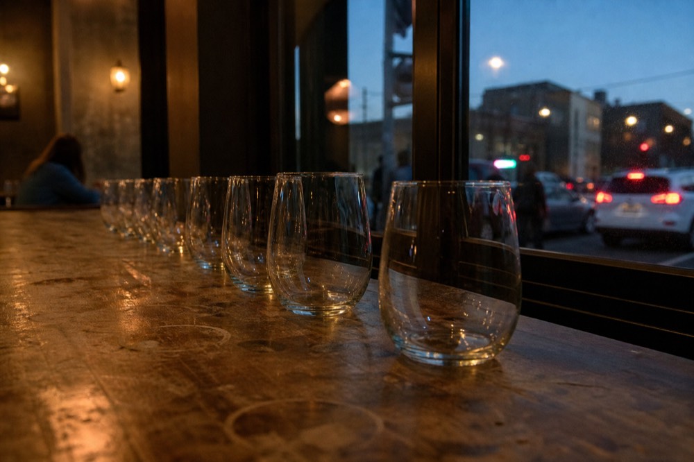 Tasting glasses lined up on a Sonoma winery counter, no text, no logos, no people